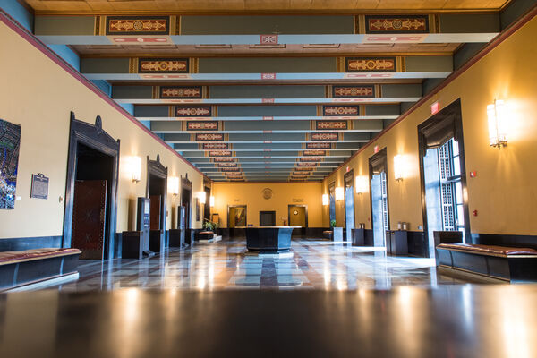The lobby in the interior of Angell Hall with Greek and Roman architectural motifs.