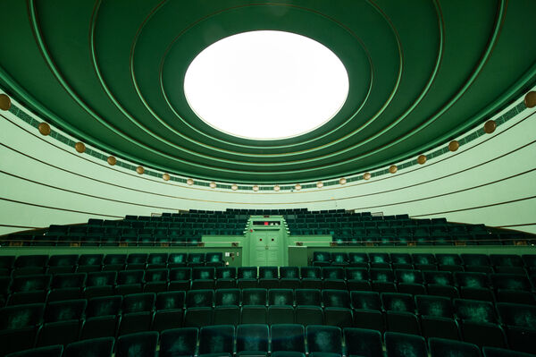 The green interior of the 4th floor amphitheater of the Rackham School of Graduate Studies