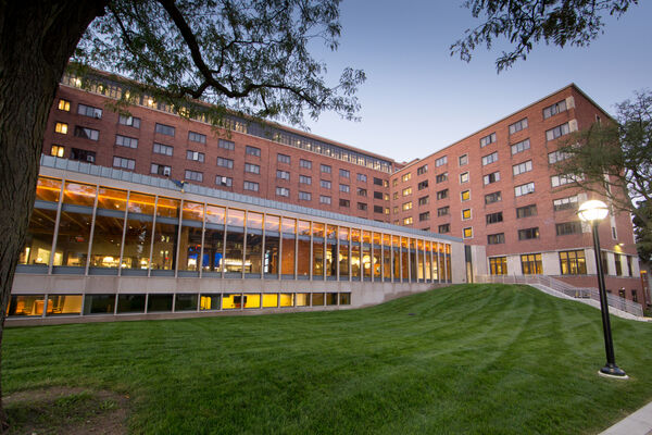 The large U-shaped residence hall with the large single-story dining hall spanning the ends of the building