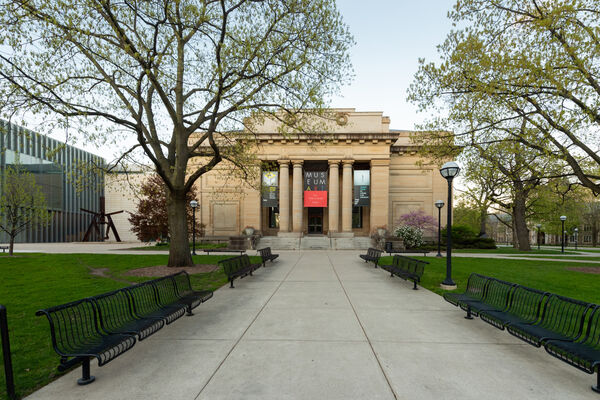 The stately Alumni Memorial Hall portion of the museum with columns along the entrance
