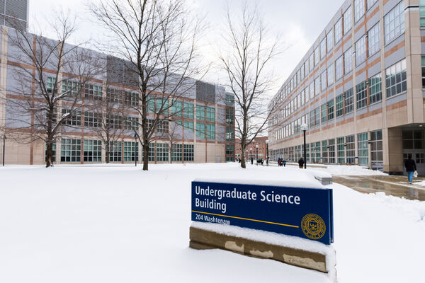 The Undergraduate Science Building with snow on the grounds in winter